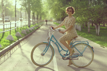 girl on a bicycle spring morning