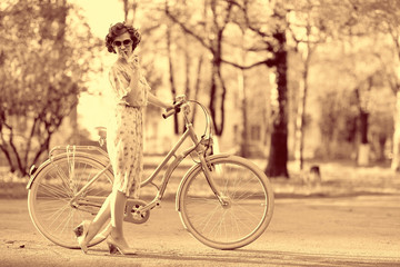 Vintage sepia portrait of a girl hipster concept