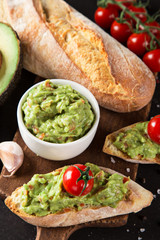 Guacamole with bread and avocado