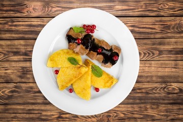 Meat. Barbecue with sauce and vegetables