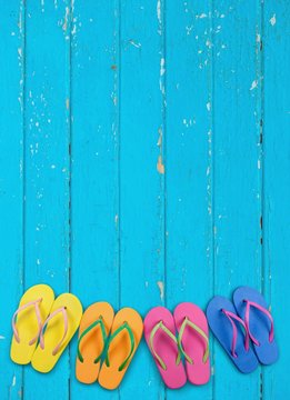 Summer. Flip flops with blue decking