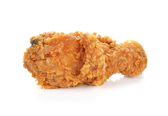 Golden brown fried chicken drumsticks on white background.