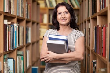 Women. Holding Books