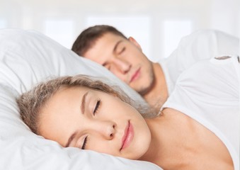 Fototapeta na wymiar Sleeping. Close-up of a young couple sleeping