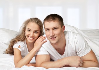 Fototapeta premium Couple. Portrait of a mature couple lying on bed