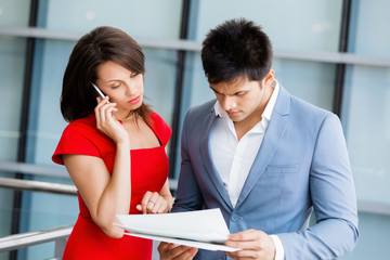 Two young business collegue in office