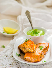 fried fillet of a salmon with green peas sauce