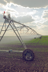 Automated Farming Irrigation Sprinklers System in Operation
