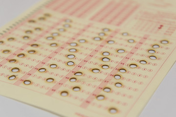 Burn Holes on Optical mark recognition sheet.