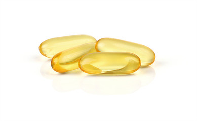 Fish oil supplement capsules isolated on white background