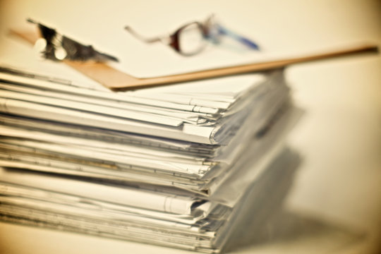Big stack of papers ,documents on the desk
