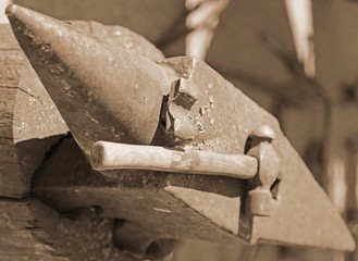 Anvil and sturdy hammer in the workshop of the blacksmith