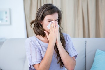 Fototapeta Sick woman blowing her nose obraz
