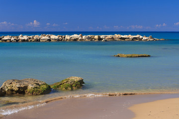 Beautiful Mediterranean beach with coral sand. 
