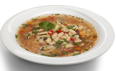 bean soup in a bowl. Isolated over white