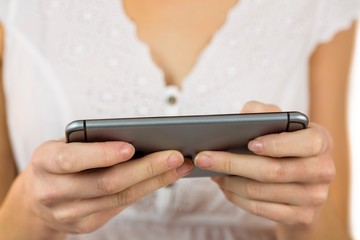 Woman sending a text message
