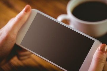 Woman using her smartphone