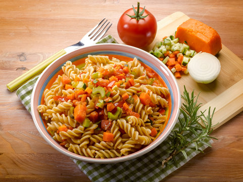 fusilli with zucchinis carrots and fresh tomatoes
