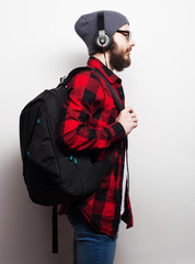 Fototapeta na wymiar young bearded man listening to music