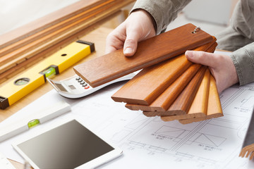 Interior designer choosing a baseboard