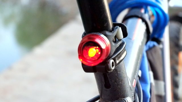 Rear part of the velo bike with flashing red light