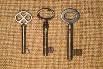A lot old keys to the safe on a very old cloth