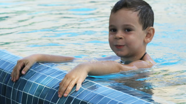 little boy in a swimming pool