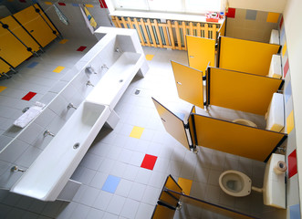 kindergarten bathroom with washbasins and cabins