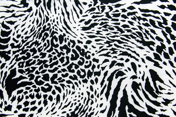 Fototapeta premium tekstura tkaniny drukowanej w paski zebra i lamparta na tle