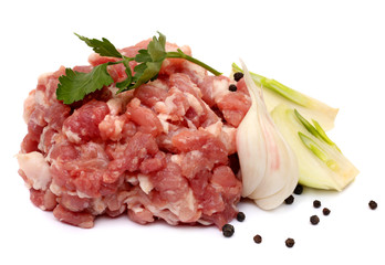 Minced meat, onion, garlic, pepper and herbs isolated white