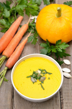 Pumpkin soup and fresh vegetables