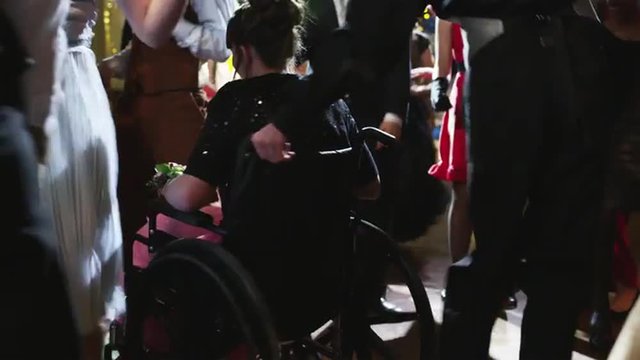 MS Students dancing on prom night, including girl in wheelchair / Cedar Hills, Utah, USA