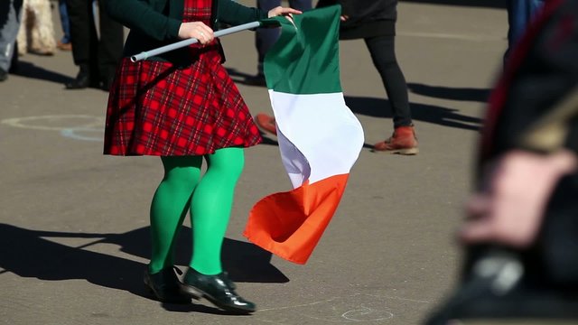 Irish dance for St. Patrick's Day with national Irish flag