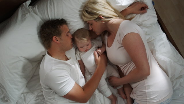 parent and baby sleeping