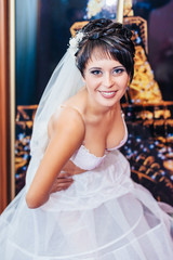 Naklejka premium Nude bride Striptease. Beautiful girl in white lingerie play