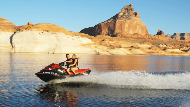 couple on a wave runner