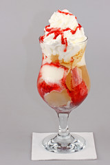 Ice cream with strawberry syrup