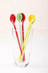 colorful spoon in clear glass