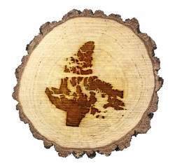 Slice of wood (shape of Nunavut branded onto) .(series)