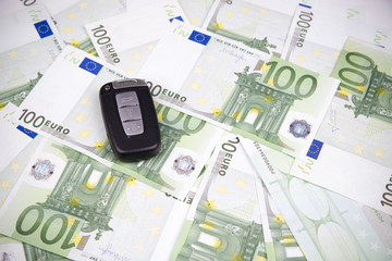 Car key on a background of euro