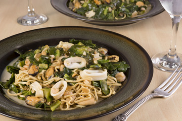 Noodles with seafood served on a plate