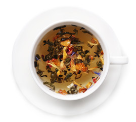 Cup of herbal tea isolate on white