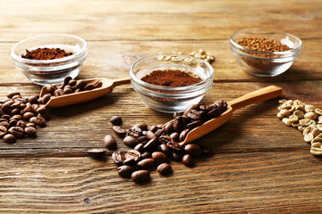 Various of coffee in small dishes on wooden background
