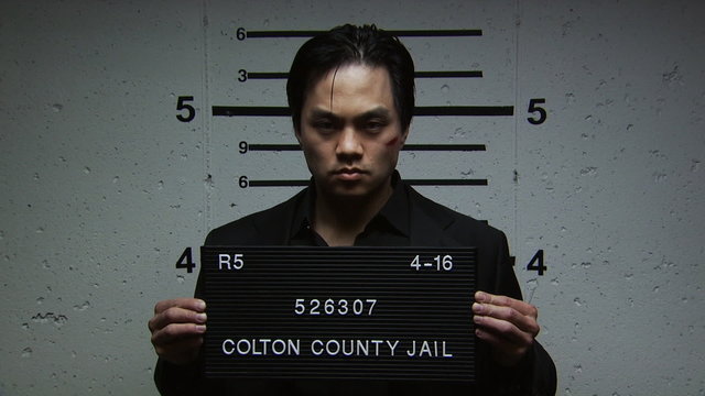 A man being booked for a crime