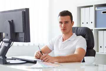 Fototapeta premium Graphic designer working on digital tablet
