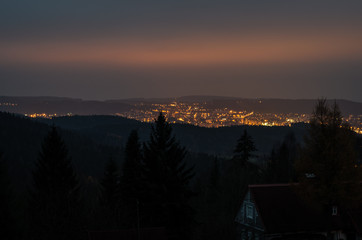 Night city in the mountains