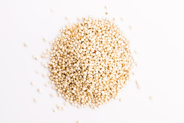 Pile of quinoa grain on a white background