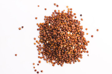 Pile of quinoa grain on a white background