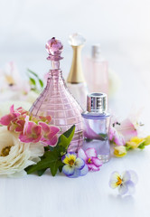 Obraz na płótnie Canvas perfume and aromatic oils bottles