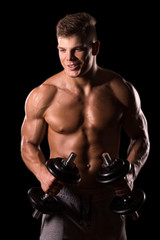 muscular man bodybuilder holding weights